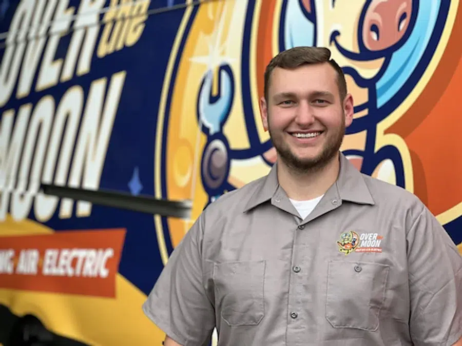 Technician in front of van in Brookfield.