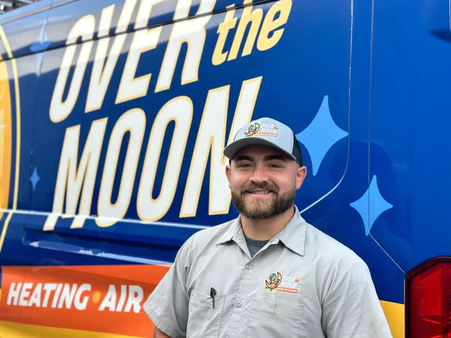 Technician in front of van in Brookfield.