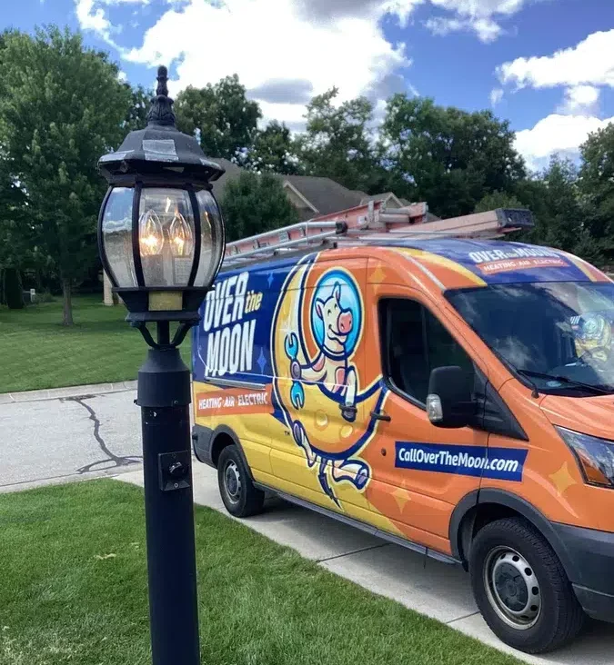 Over the Moon van in residential driveway in Brookfield.